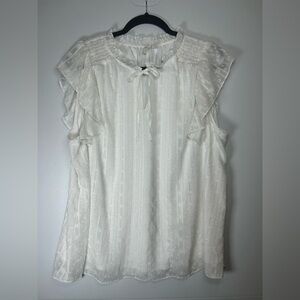 White Ruffle Sleeveless Blouse with Tie Neck.
